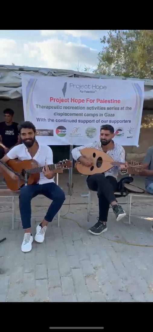 Musicians at a therapeutic recreation session in the camps.