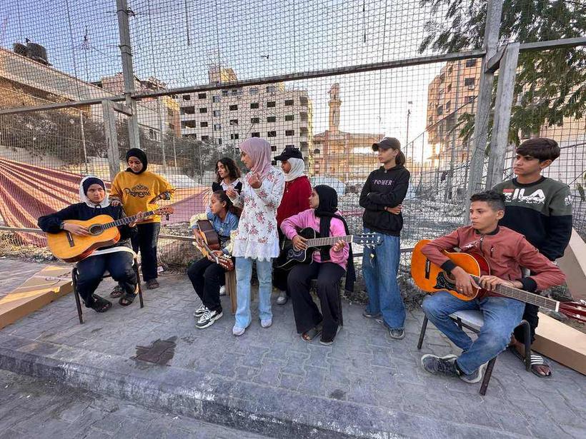A guitar circle for children, run by the musicians we support.