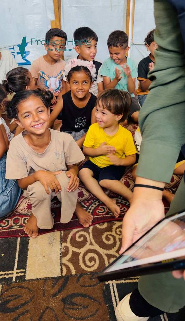 Children at an orphan camp supported by Project Hope.